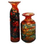 Two orange Mdina glass vases with blue trailed decoration, tallest 31.5cm Good condition, no chips