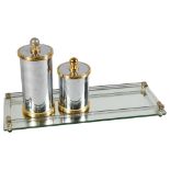 A Hollywood Regency style, mirror glass tray, with mirrored metal cannisters, length 40cm Tray has