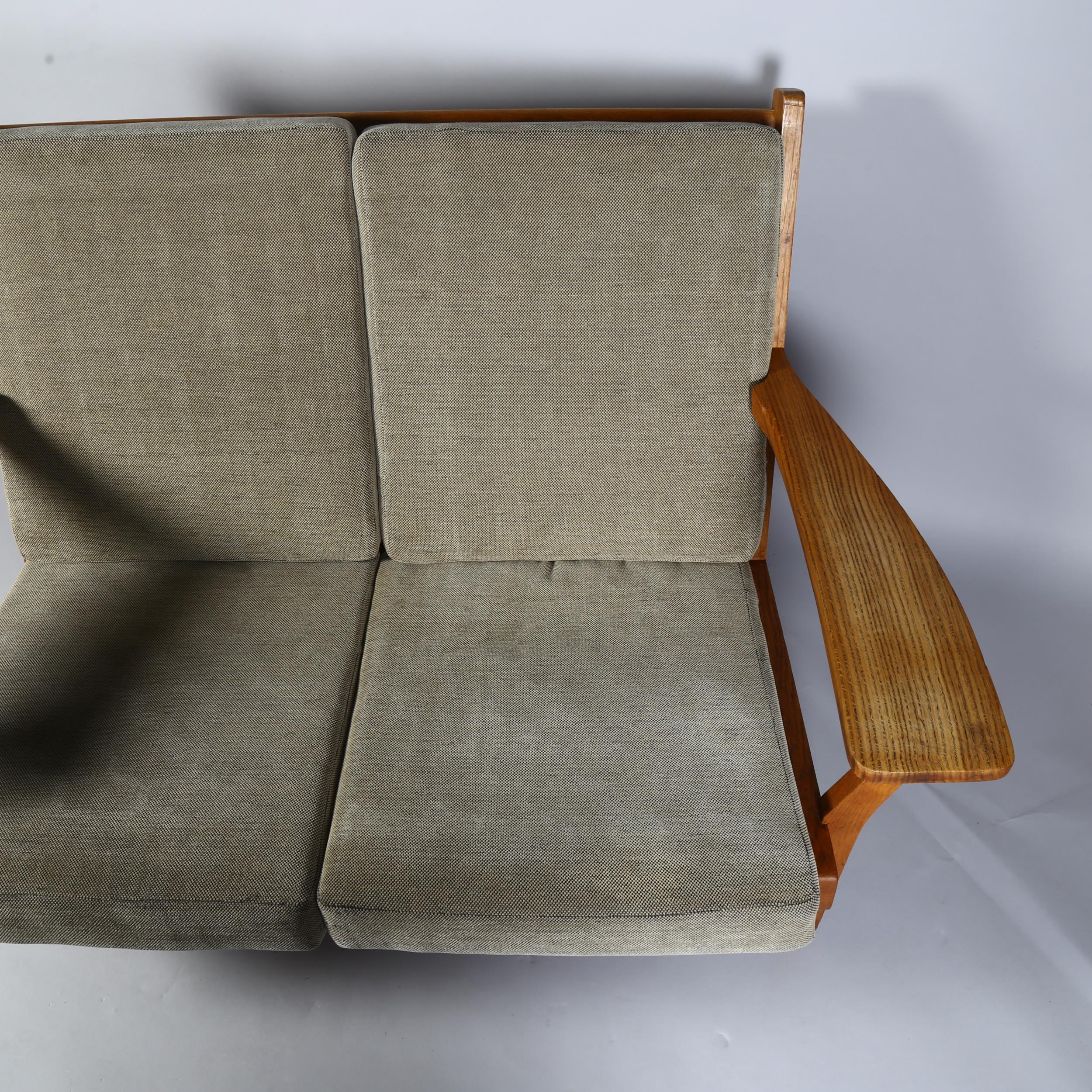 Hans Wegner, a mid-century Danish 2-seater sofa, model GE 330/2 by Getama, the oak frame with - Image 2 of 4