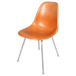 Charles Eames, an EARLY DSX fibre glass shell chair with moulded maker’s marks, height 80cm Repair