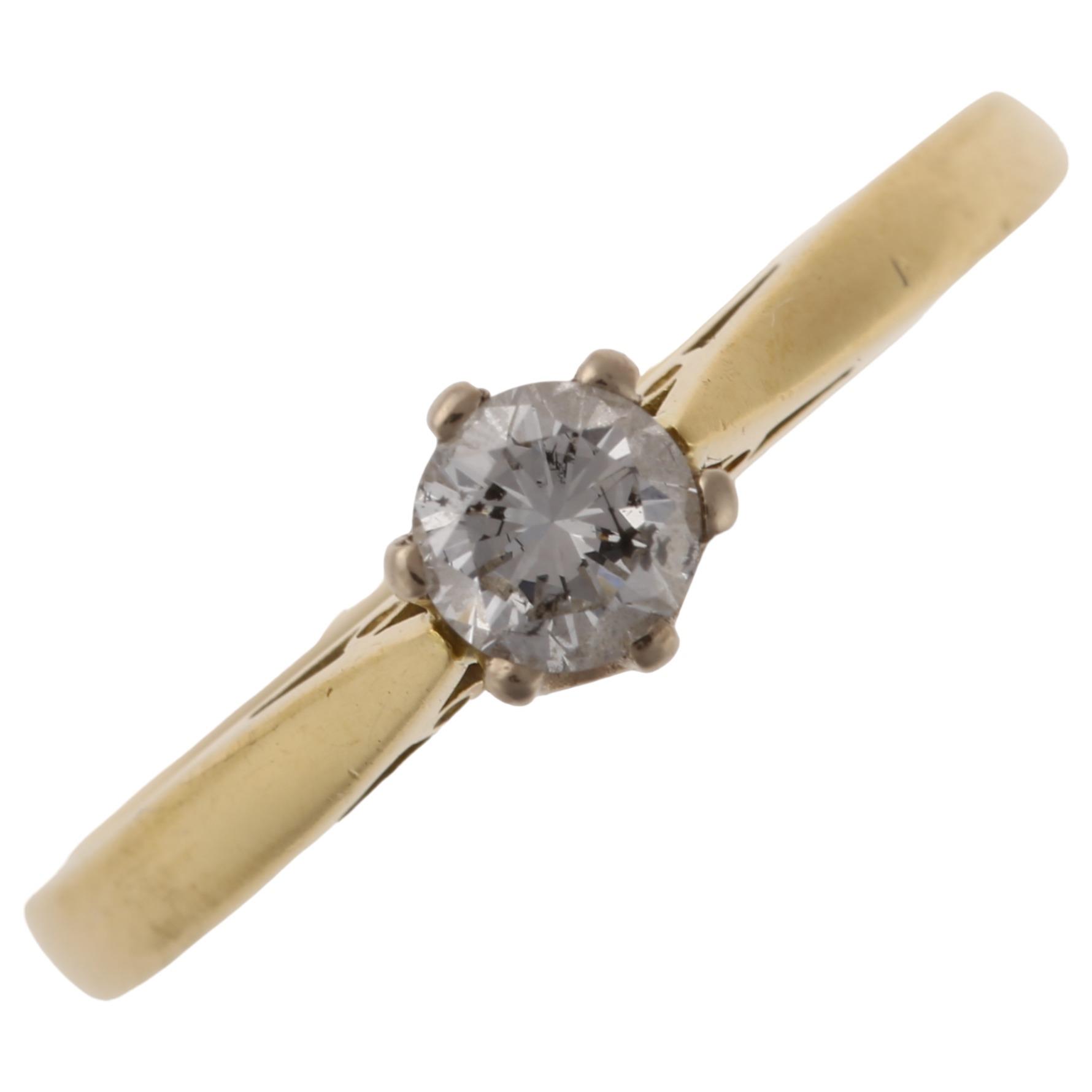 An 18ct gold 0.25ct solitaire diamond ring, prong set with modern round brilliant-cut diamond,