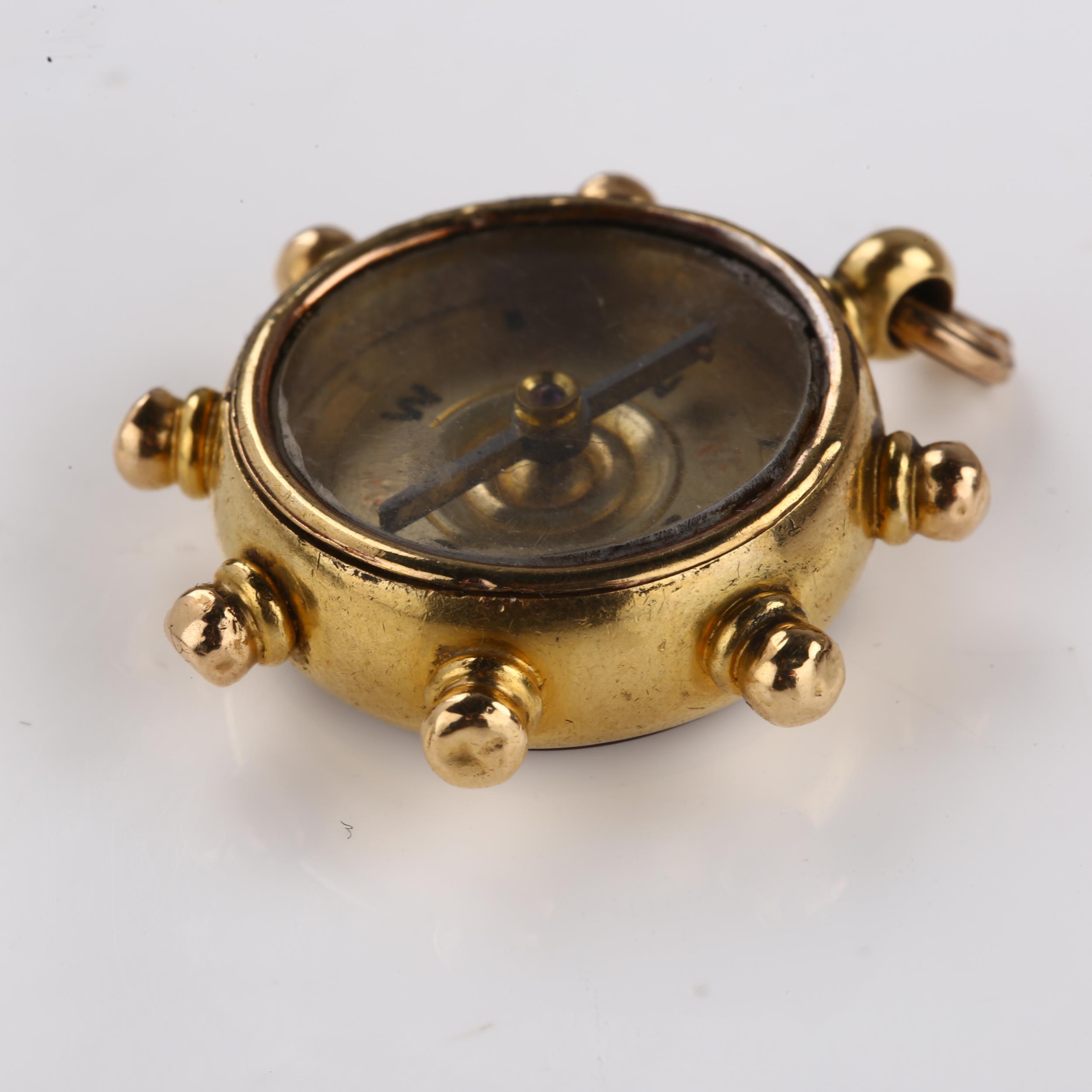 A late Victorian 18ct gold carnelian ship's wheel compass fob, maker's marks B and S, hallmarks - Image 2 of 4