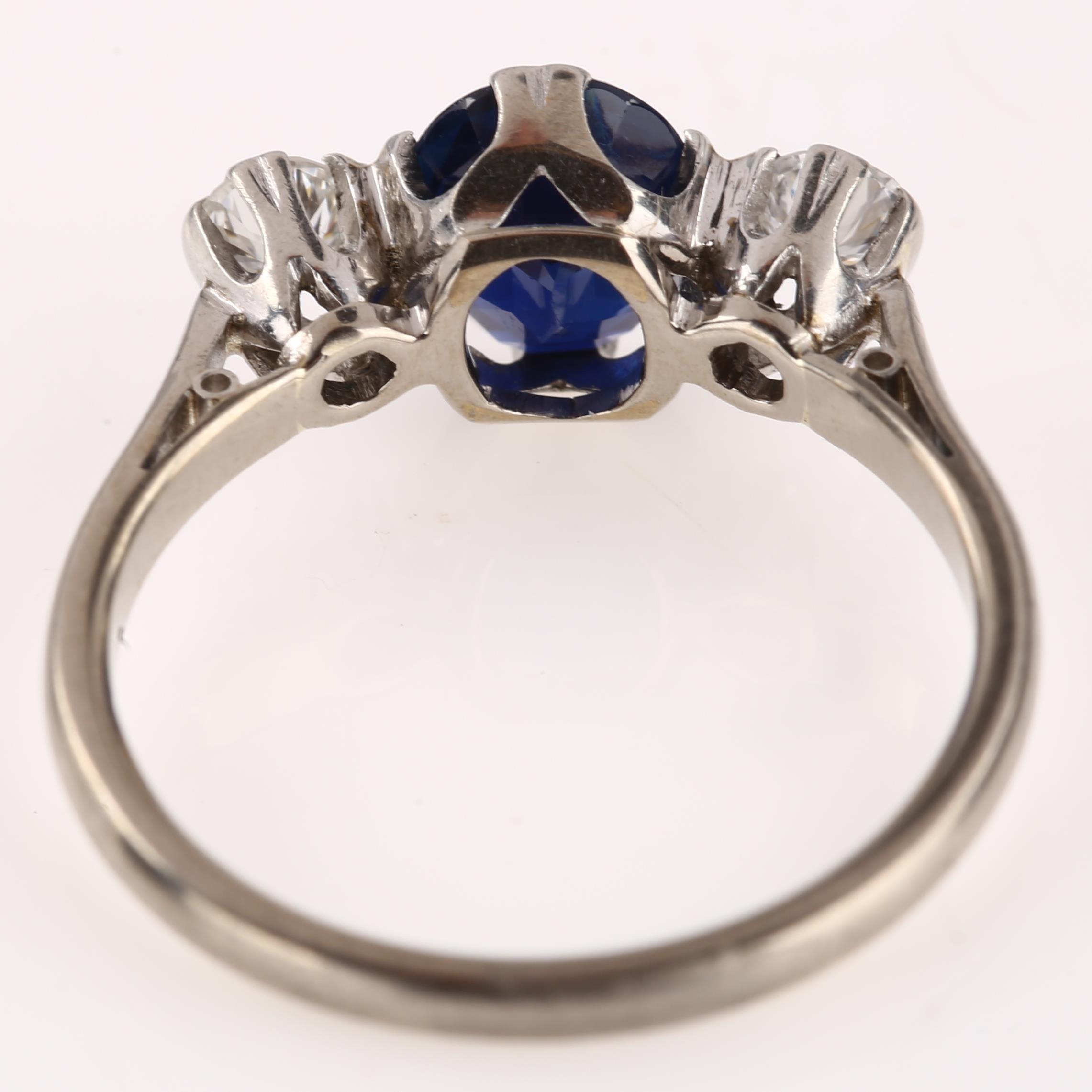 A late 20th century 18ct white gold three stone sapphire and diamond ring, platinum-topped set - Image 3 of 4