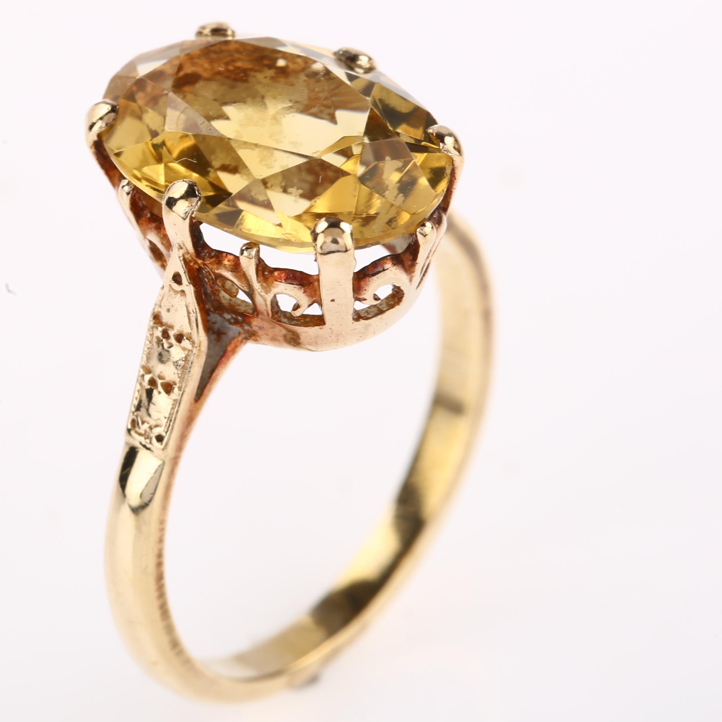 A late 20th century 9ct gold citrine dress ring, set with oval mixed-cut citrine, hallmarks - Image 2 of 4