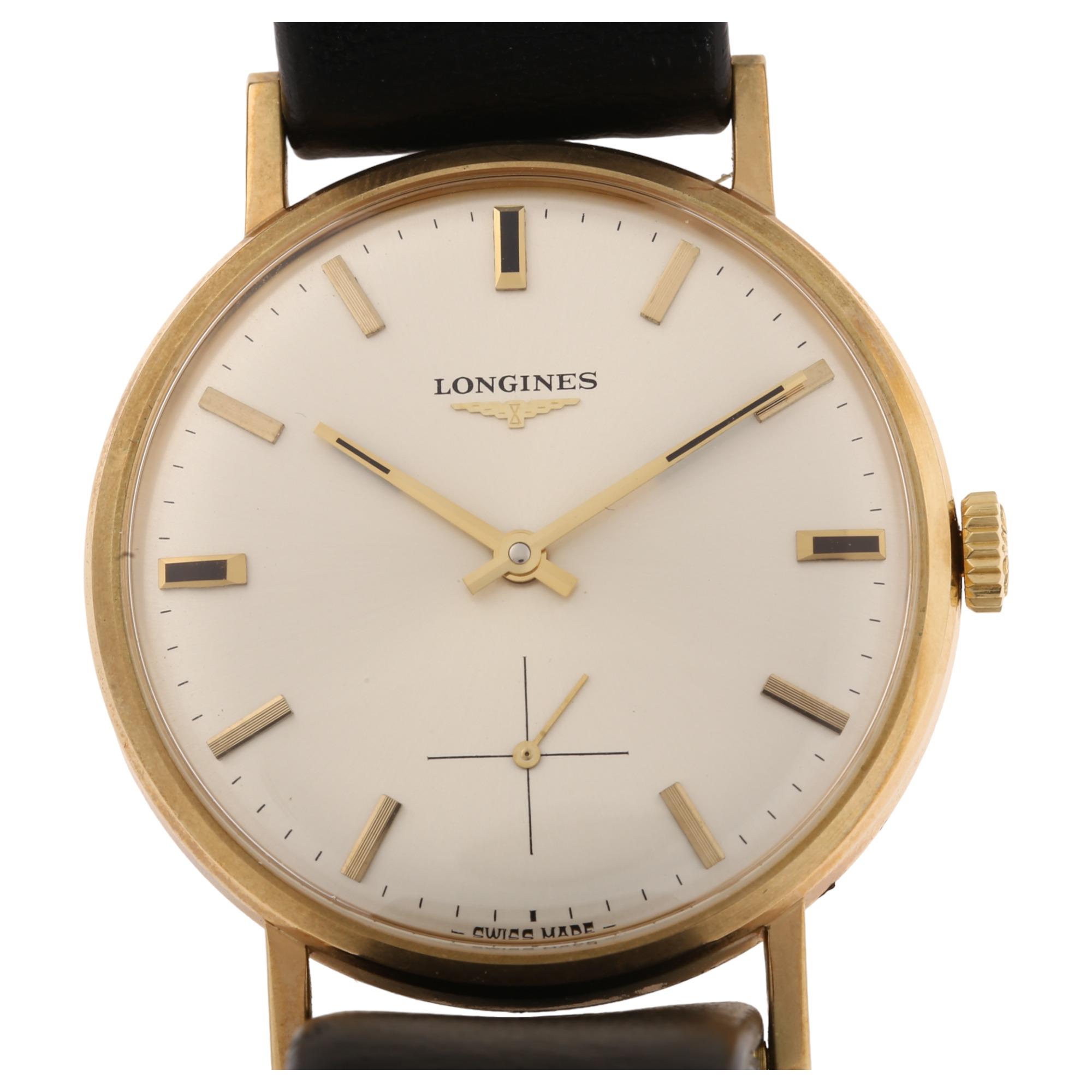 LONGINES - a 9ct gold mechanical wristwatch circa 1972, silvered dial with gilt baton hour markers