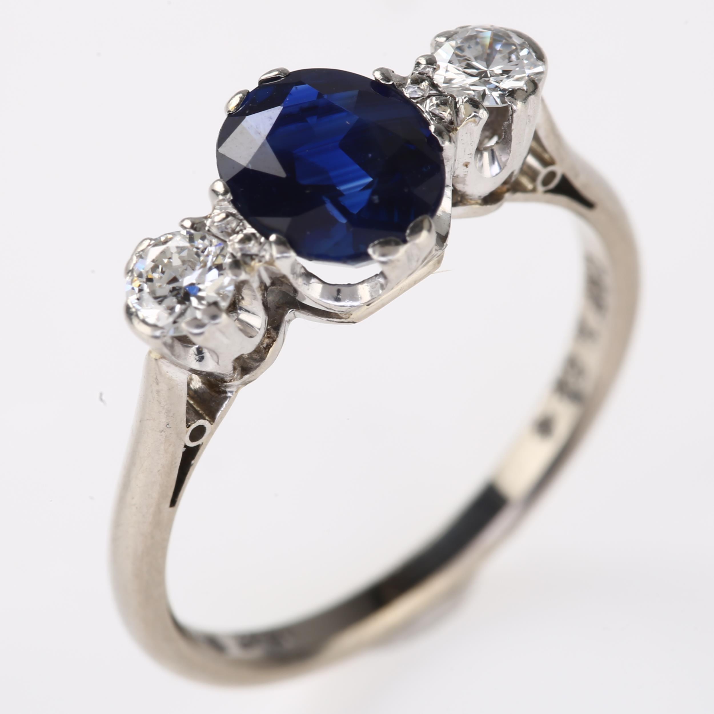 A late 20th century 18ct white gold three stone sapphire and diamond ring, platinum-topped set - Image 2 of 4