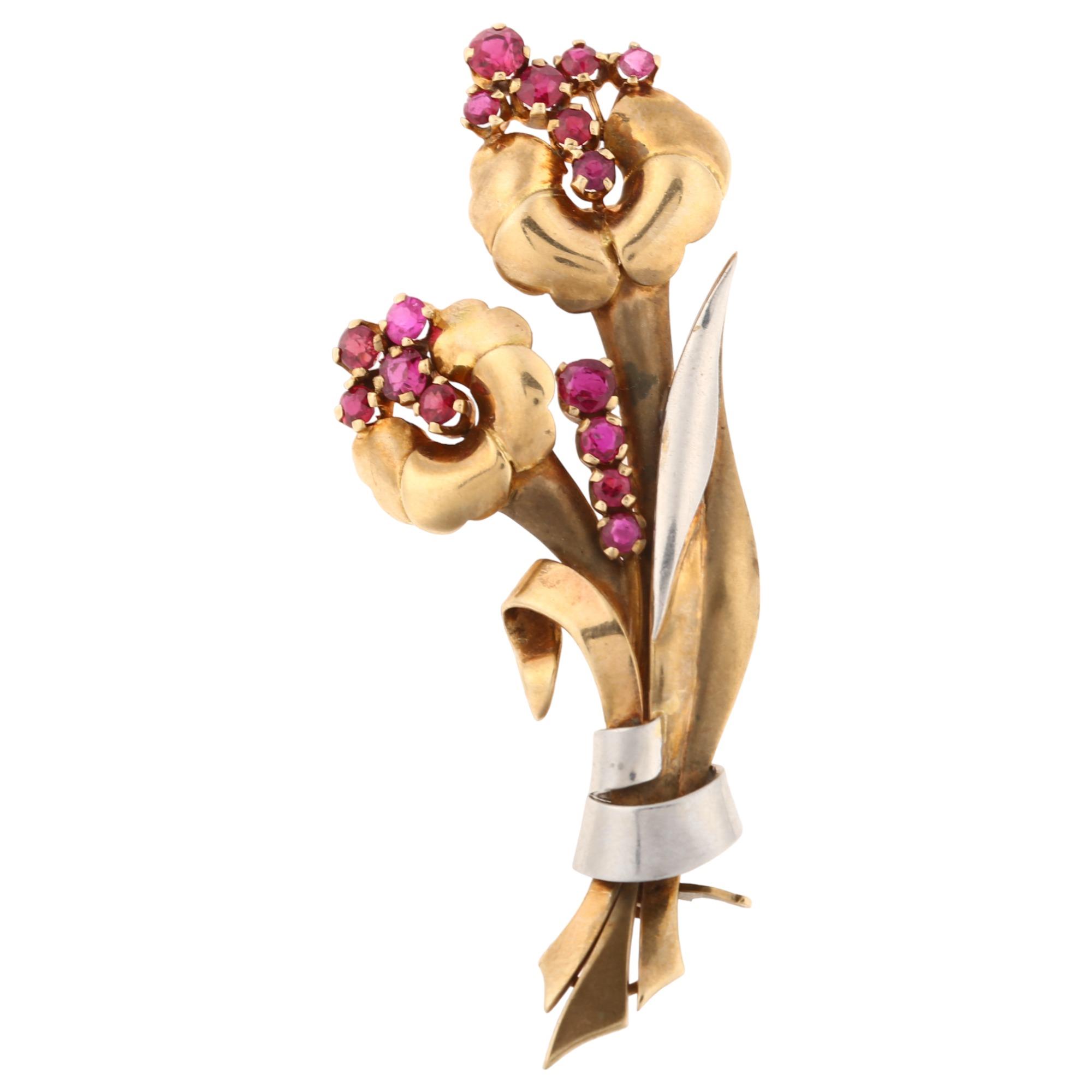 A late Art Deco French ruby floral spray brooch, circa 1940, unmarked yellow and white gold settings