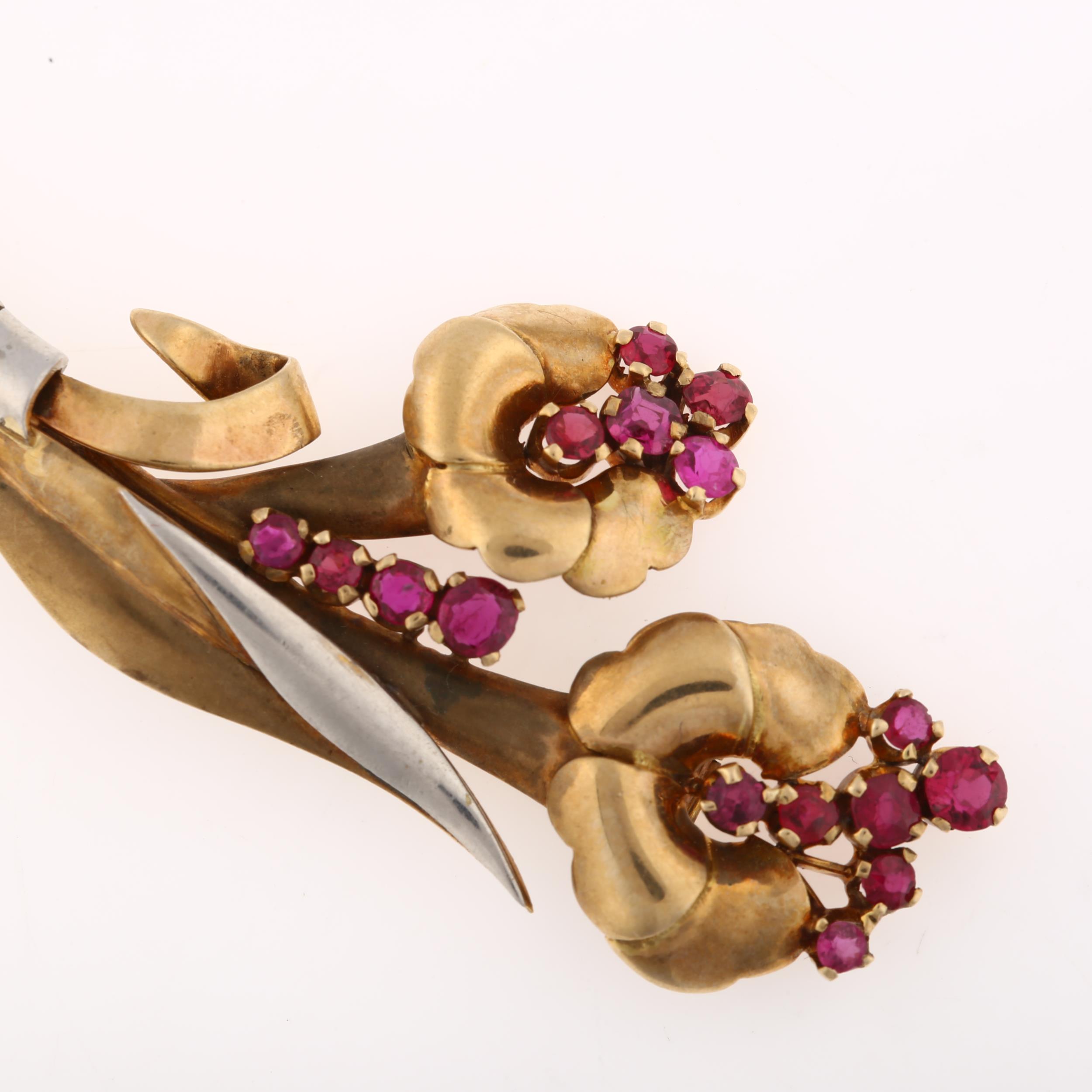 A late Art Deco French ruby floral spray brooch, circa 1940, unmarked yellow and white gold settings - Image 2 of 4