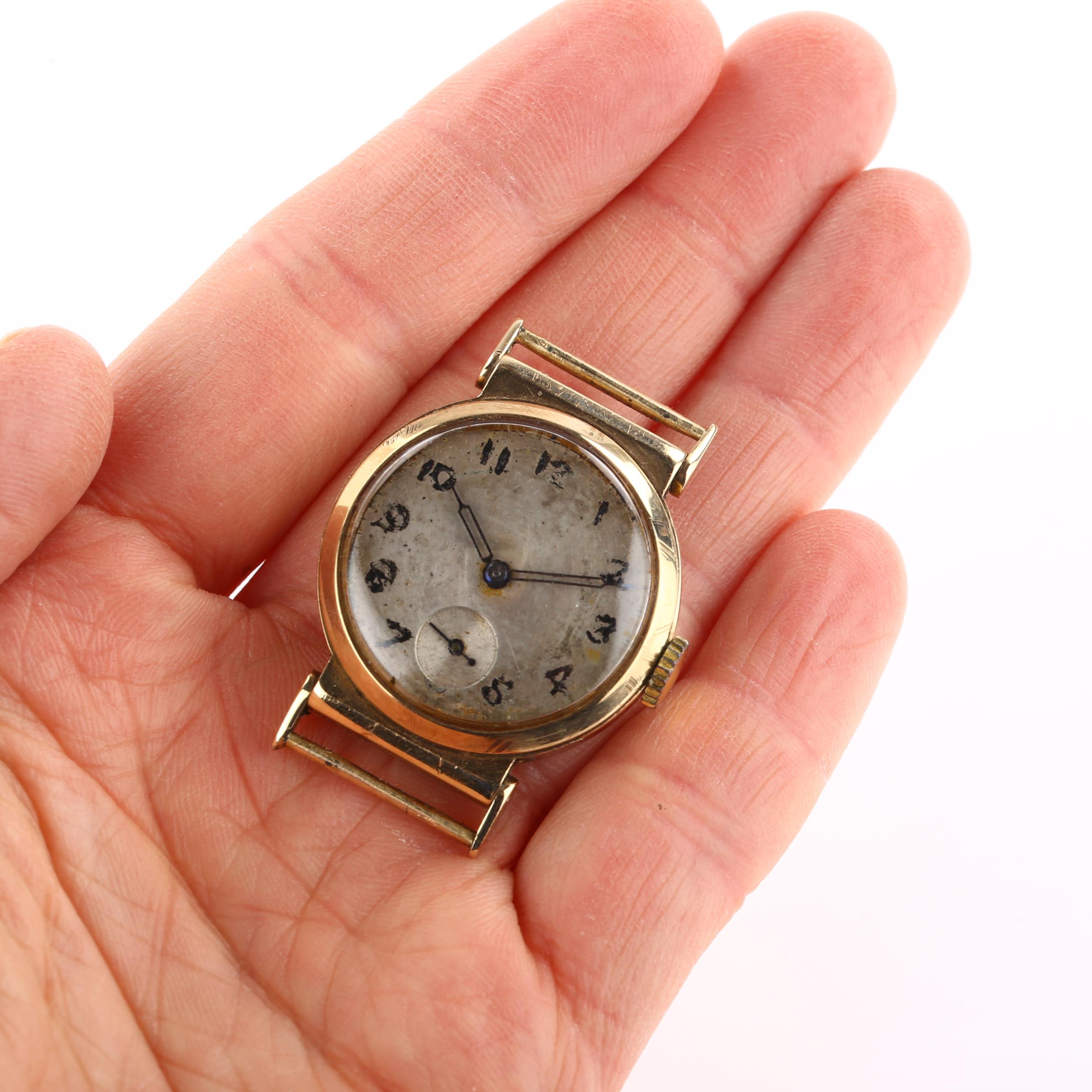 A mid-20th century 9ct gold wristwatch head, silvered dial with hand painted Arabic numerals, - Image 5 of 5