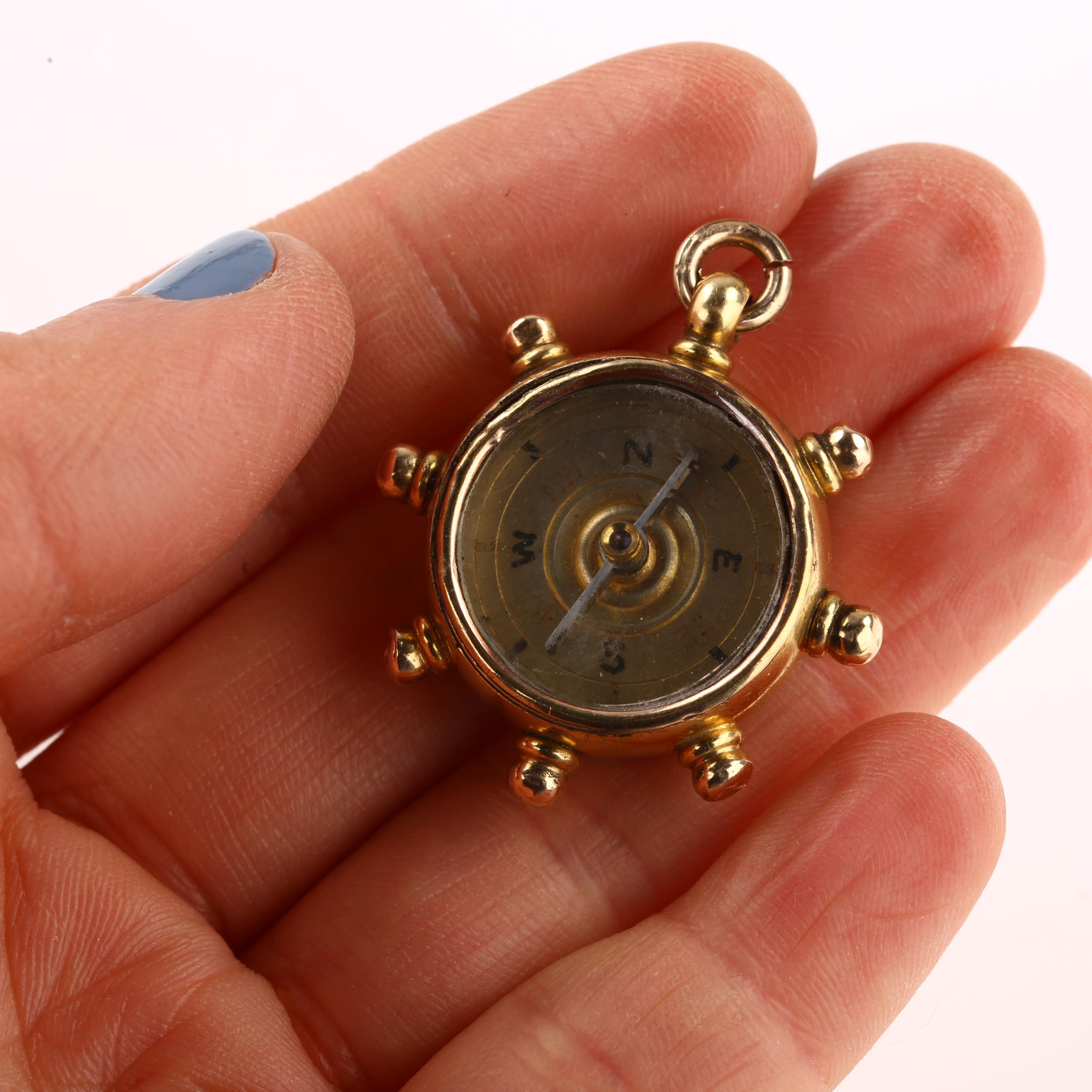 A late Victorian 18ct gold carnelian ship's wheel compass fob, maker's marks B and S, hallmarks - Image 4 of 4