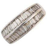 A modern 18ct white gold diamond band ring, ridge set with baguette-cut diamonds, total diamond