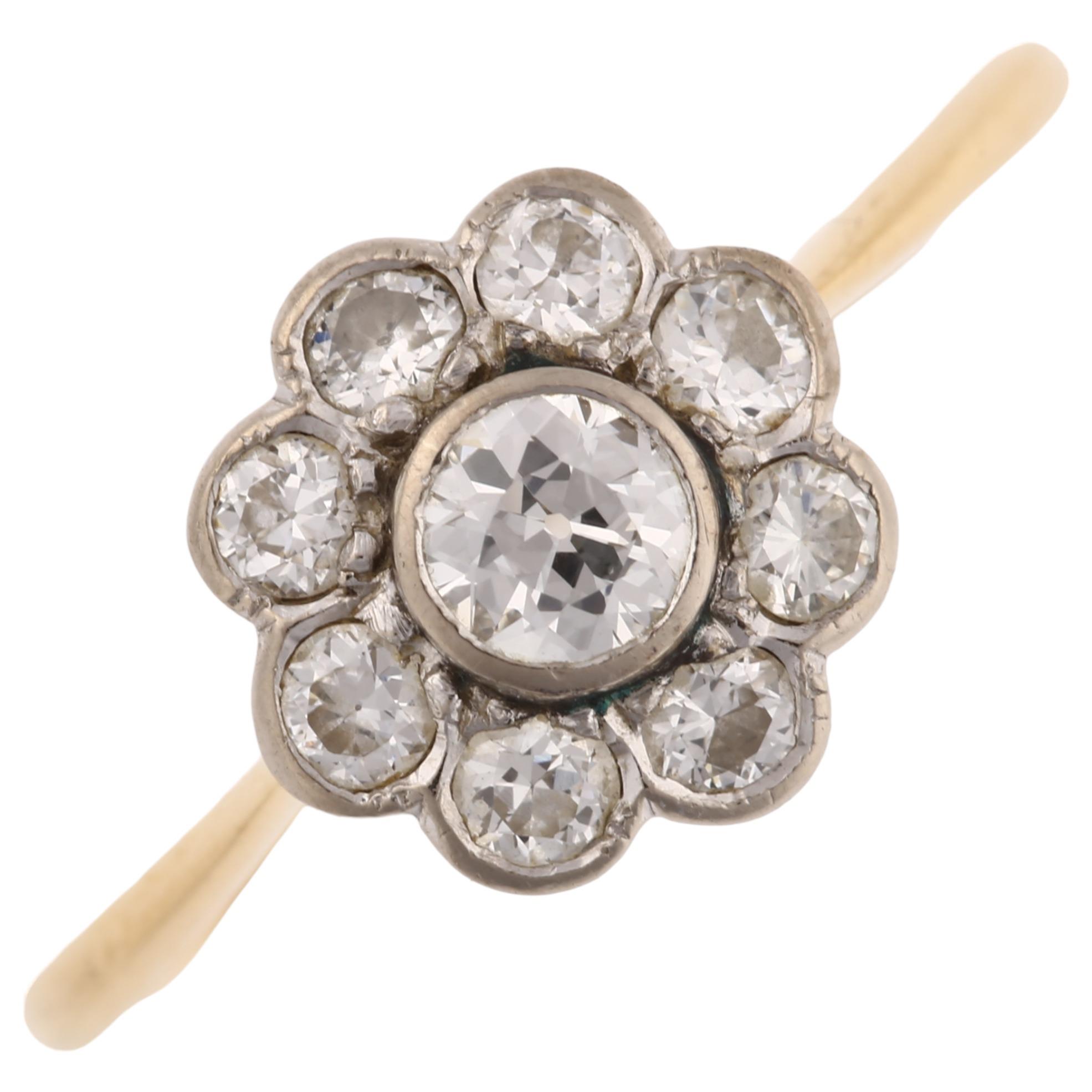 A mid-20th century diamond cluster flowerhead ring, unmarked gold settings, set with modern round