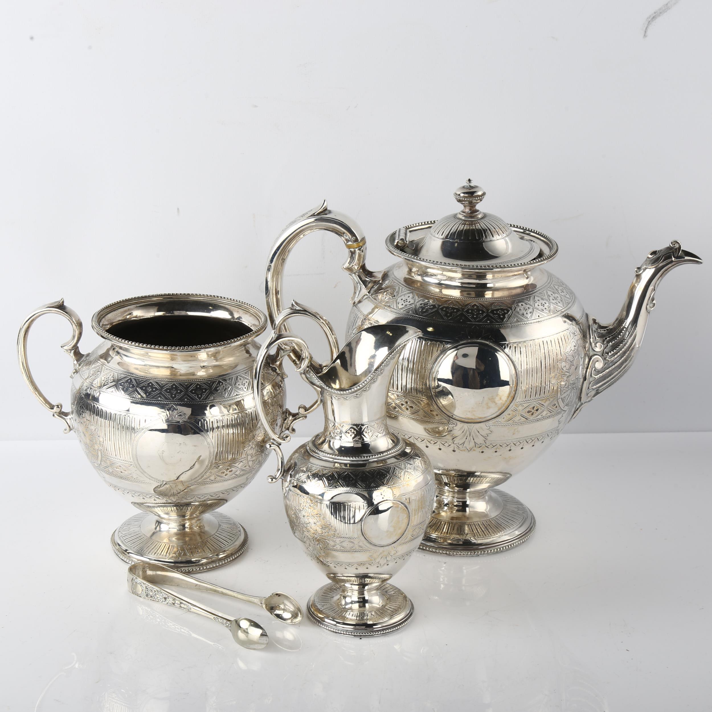A Victorian silver 3-piece tea set, comprising teapot, 2 handled-sugar bowl and cream jug, ovoid - Image 2 of 3