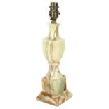 A turned alabaster table lamp (no shade), height to top of bayonet fitting 33cm