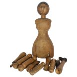 A Vintage Folk art carved and stained wood jointed doll, head and body height 34cm