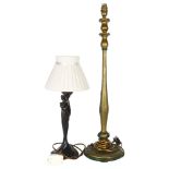 A resin table lamp in the form of a female figure, and a larger wooden table lamp, painted with