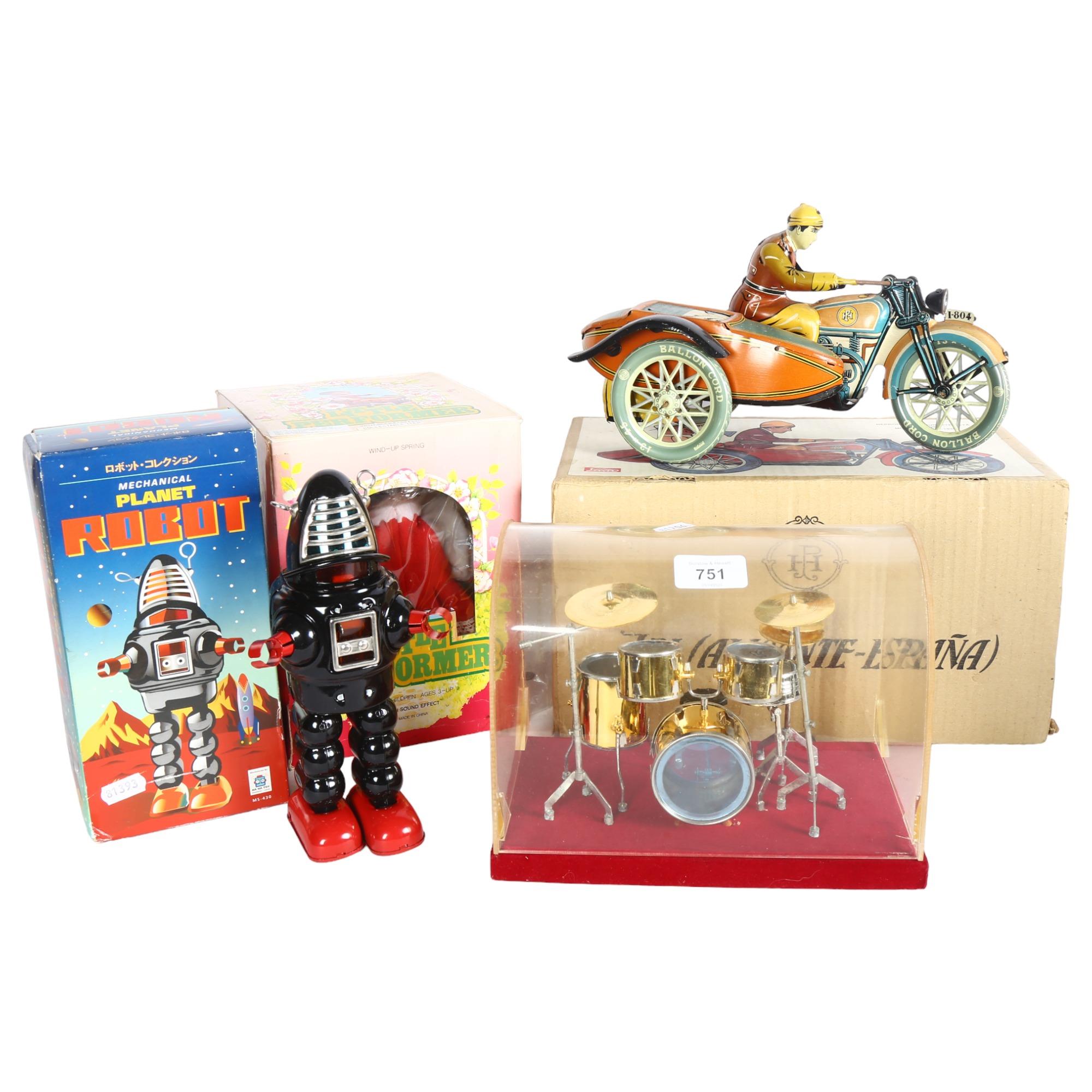 A quantity of Vintage and modern tinplate wind-up clockwork toys, mostly in original boxes,