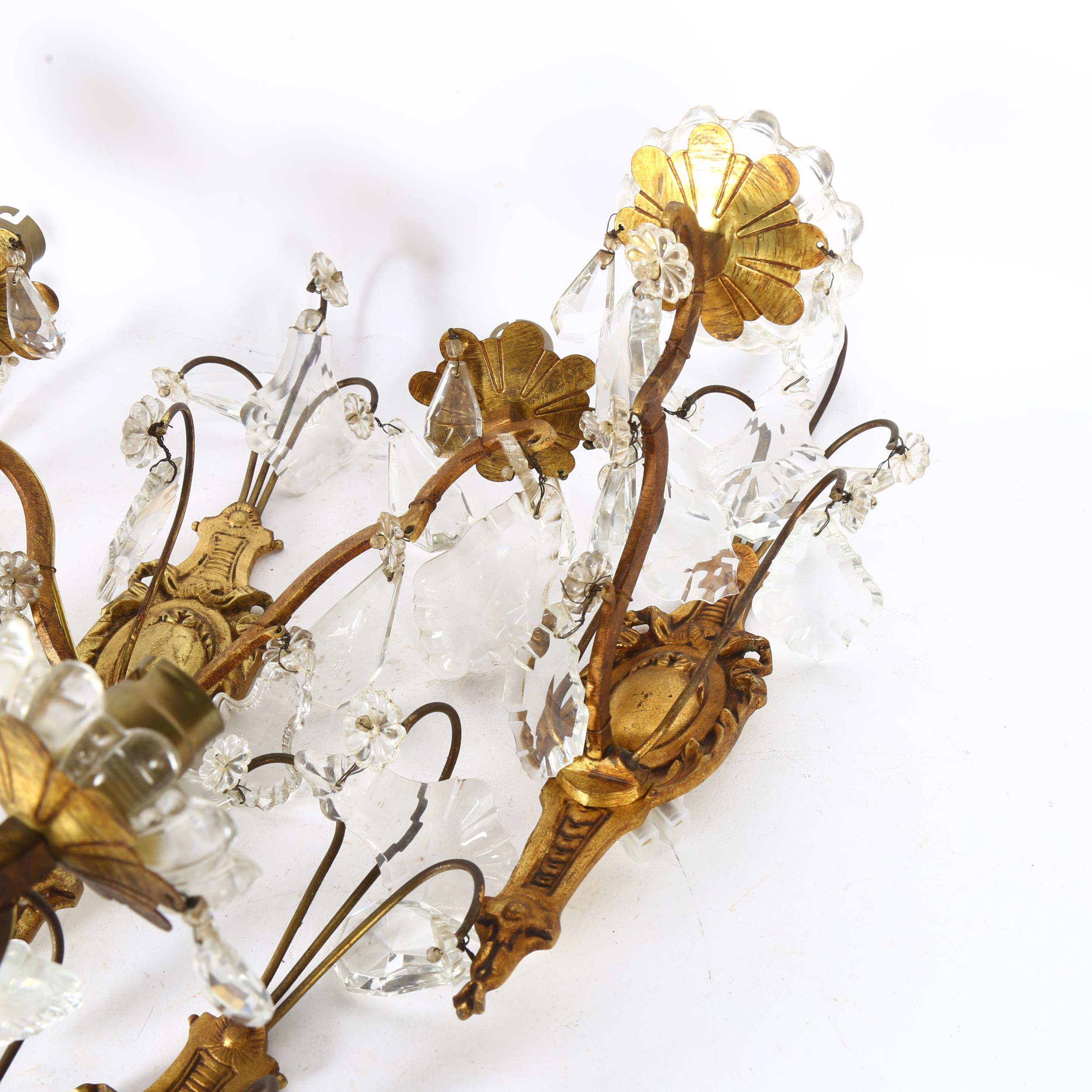 A set of mid-20th century crystal hung gilded brass wall sconces, comprising 4 single light and 1 - Image 2 of 2