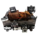 A quantity of Vintage cameras and equipment, including a Brownie Six-20 camera model C, a Canon