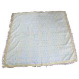 A Middle Eastern silvered thread wall hanging/throw, with floral pattern, 130cm square