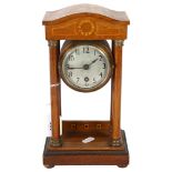 A small Edwardian mahogany and inlaid Portico clock, with key and pendulum, H27cm