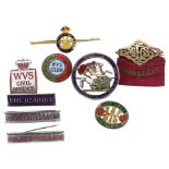 A collection of various badges, including an Order of the Garter enamel badge, the Hertfordshire