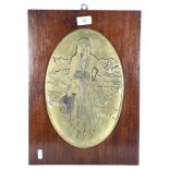 J. Kazazian?, an embossed oval bronze plaque, study of a Middle Eastern water carrier, mounted on