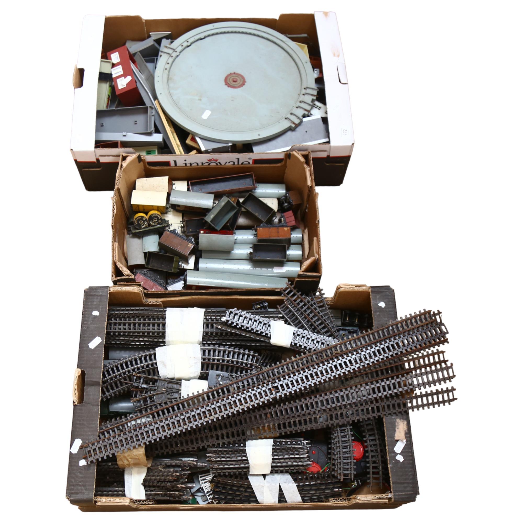 A quantity of Vintage OO gauge train track, and various associated accessories, including