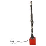 JOHN PACKER - a JP021 clarinet that has been converted into a lamp, on a modern wooden base,