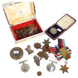 Second World War medals, a US Army compass, a Victorian silver florin brooch, shrapnel and badges