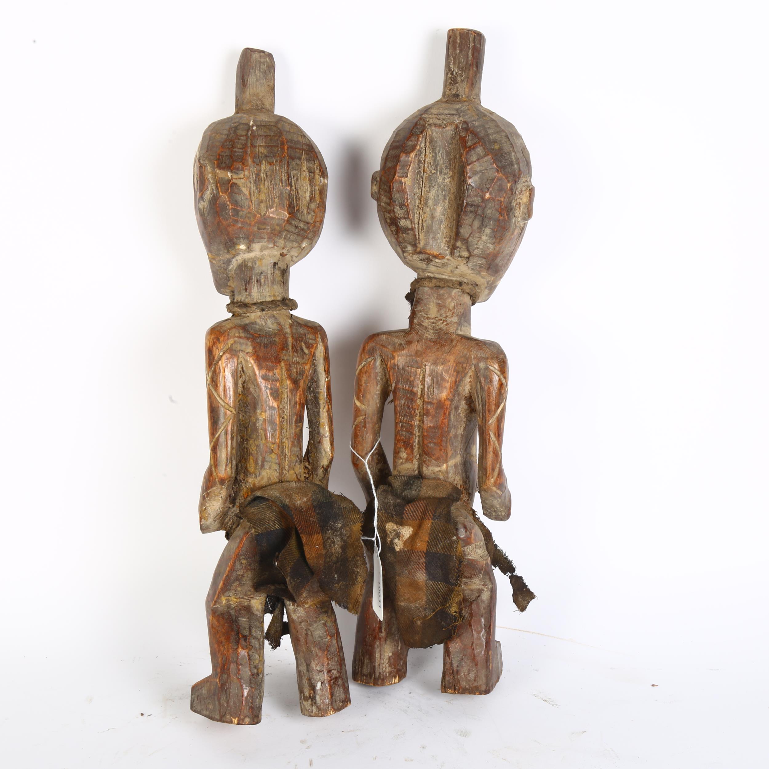 A pair of West African carved wood figures, tallest 44cm Natural faults in the wood, no repairs - Image 2 of 2