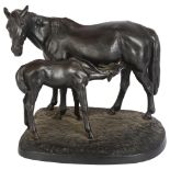 A cast-iron mare and foal group on textured stand, Kasli Foundry, impressed to the underside and