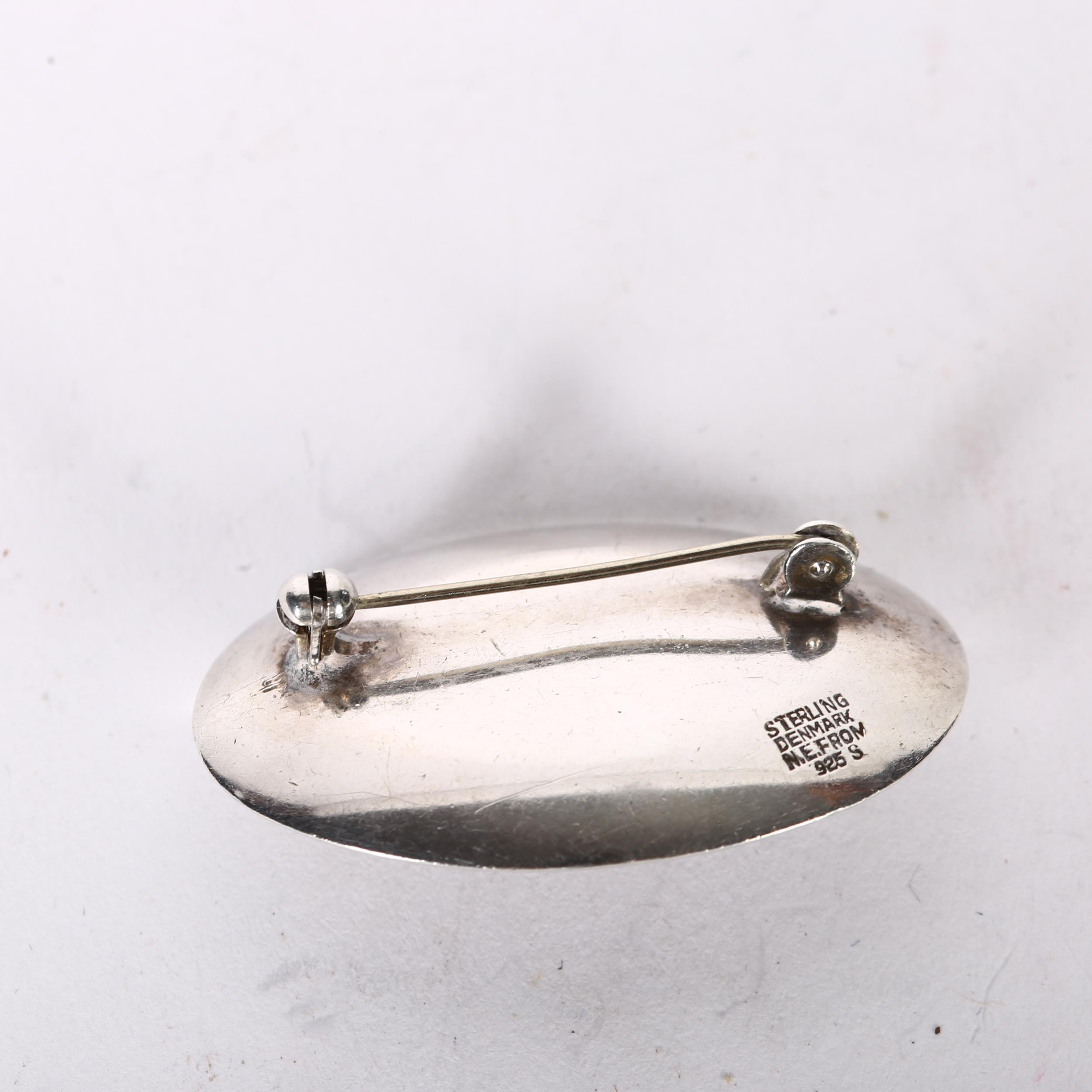 NIEL ERIK FROM - a sterling silver and oval amber set shaped brooch - Image 2 of 2