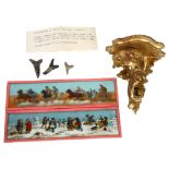 A small gilded wall bracket, H11cm, 2 glass slides, and 3 shark's teeth found at Highcliff