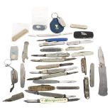 A quantity of advertising pocket knives, including Booths Old Tom, Robin Starch, Worthington's etc