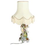 Dresden - An ornate Dresden table top lamp and shade, with cherub and floral decoration, height