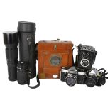 A quantity of Vintage cameras and equipment, including a Praktica Super TL camera with Carl Zeiss