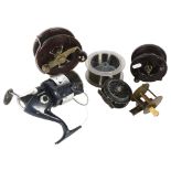 A collection of fishing reels, to including an Alvey 525/C12/7 Bakelite reel, an Alcock aerialite