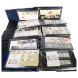 A large quantity of First Day Covers (including 11 albums), loose stamps, reference book etc