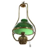 A brass oil lamp design ceiling light fitting, with green glass shade, 42cm across