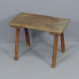 A rustic elm stool. 55x39x32cm