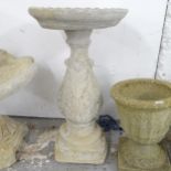 A two-section concrete bird bath. 35x62cm