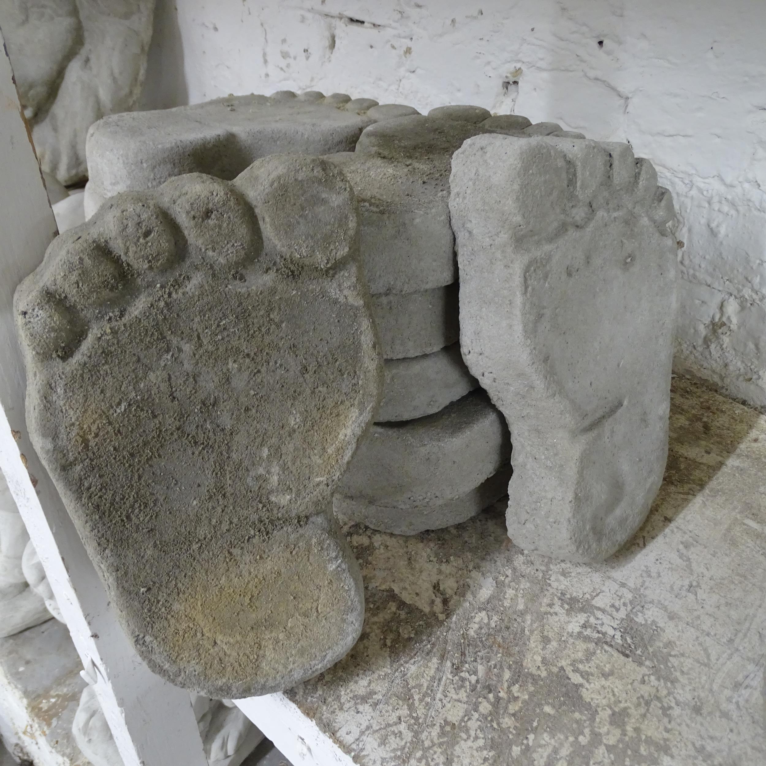 Six pairs of foot-design stepping stones. Each 16x26cm.