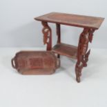 A Chinese hardwood two-tier occasional table with all-over carved decoration, 59x63x39cm, and