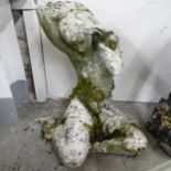 A weathered concrete garden statue, nude study of a woman. Height 51cm.