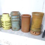 Four various terracotta chimney pots. Tallest 55cm.