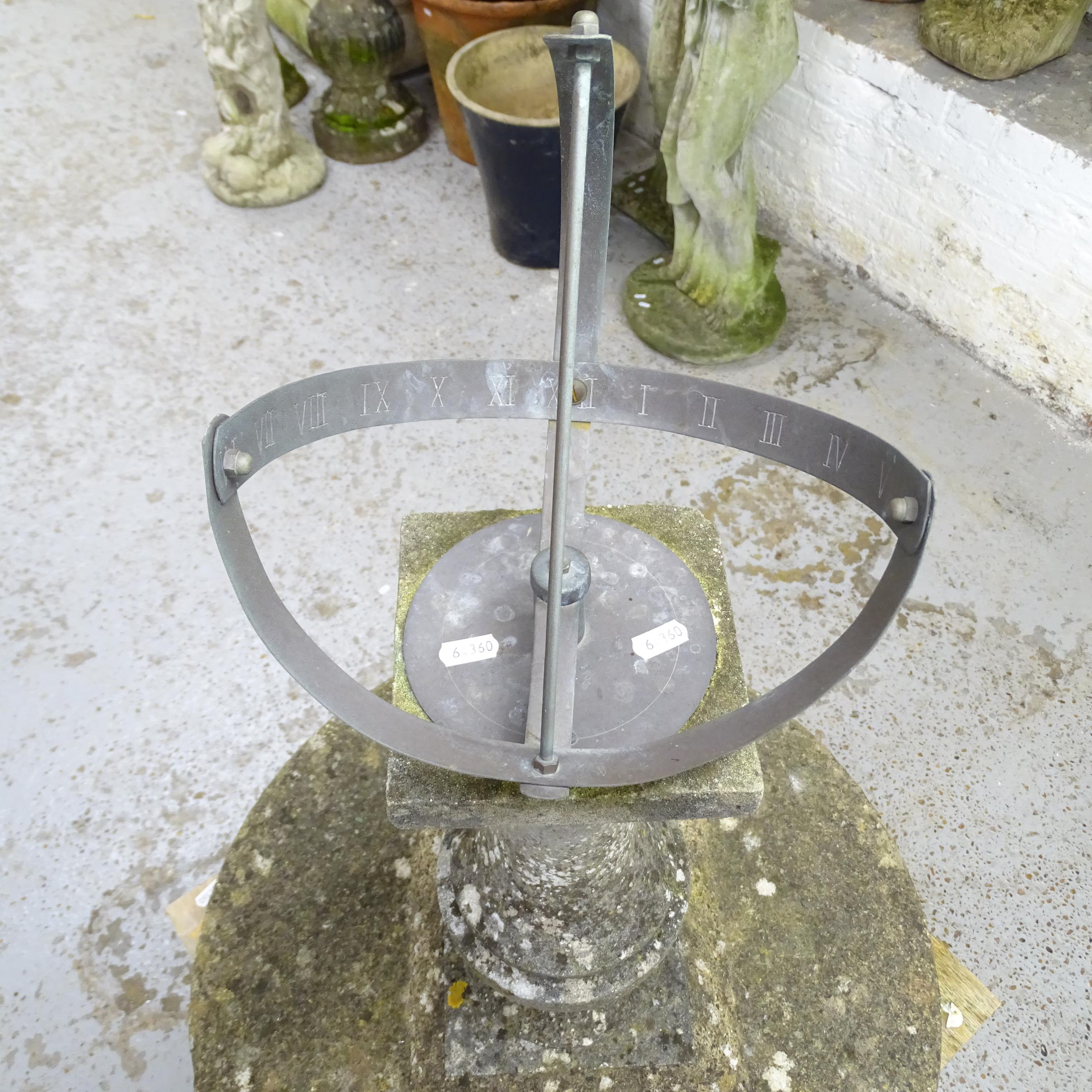 A weathered concrete sundial garden ornament, height 76cm, and an oak topped garden table cast - Image 2 of 2