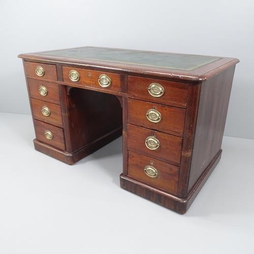 A Victorian mahogany kneehole writing desk, with ten brass Battle of Trafalgar memorial handles