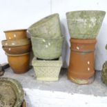 A terracotta chimney pot, height 47cm, four concrete planters six terracotta garden pots (11)