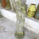 A weathered concrete garden statue, study of a lady. Height 120cm.